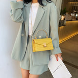 Sacs à bandoulière en cuir PU motif pierre pour femmes 2020 Mini sac à bandoulière avec poignée en métal fourre-tout de voyage dame